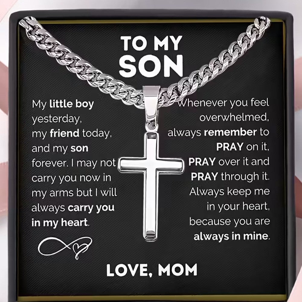 To My Son necklace from Mom: silver cross on a Cuban link chain with a message card in a black gift box