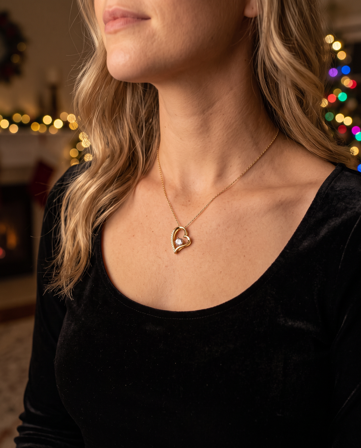 Woman wearing The Soulmate Heart gold open heart necklace with zircon centre, a romantic Christmas gift for wife or girlfriend