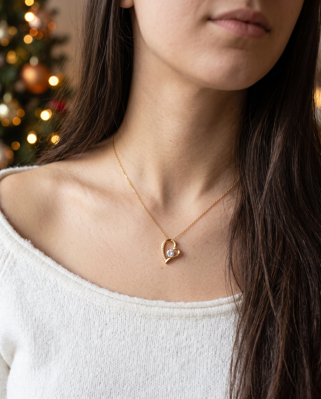 Young woman wearing The Daddy's Girl Heart gold open heart necklace, a gift for daughter from Dad